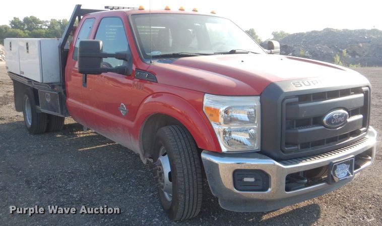 image for item DI2261 2011 Ford F350 Super Duty SuperCab flatbed pickup truck