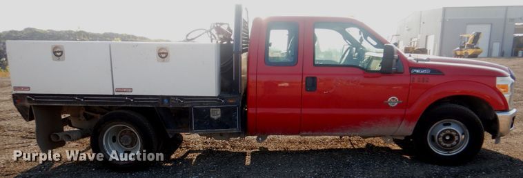 image for item DI2261 2011 Ford F350 Super Duty SuperCab flatbed pickup truck