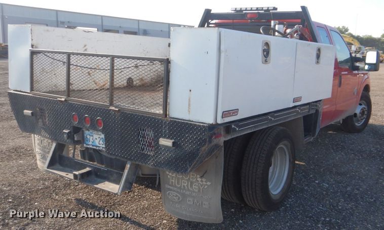 image for item DI2261 2011 Ford F350 Super Duty SuperCab flatbed pickup truck