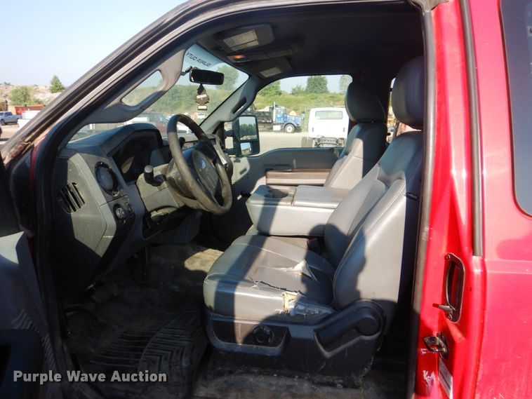 image for item DI2261 2011 Ford F350 Super Duty SuperCab flatbed pickup truck