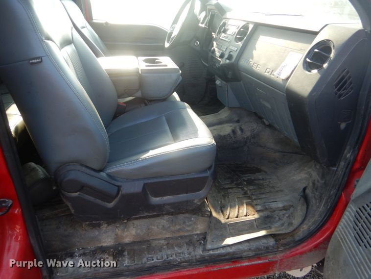 image for item DI2261 2011 Ford F350 Super Duty SuperCab flatbed pickup truck