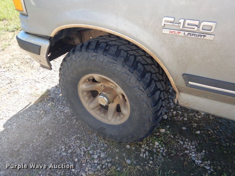 image for item EY9284 1991 Ford F150 XLT Lariat flatbed pickup truck