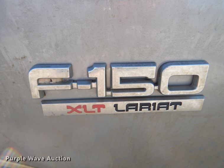 image for item EY9284 1991 Ford F150 XLT Lariat flatbed pickup truck