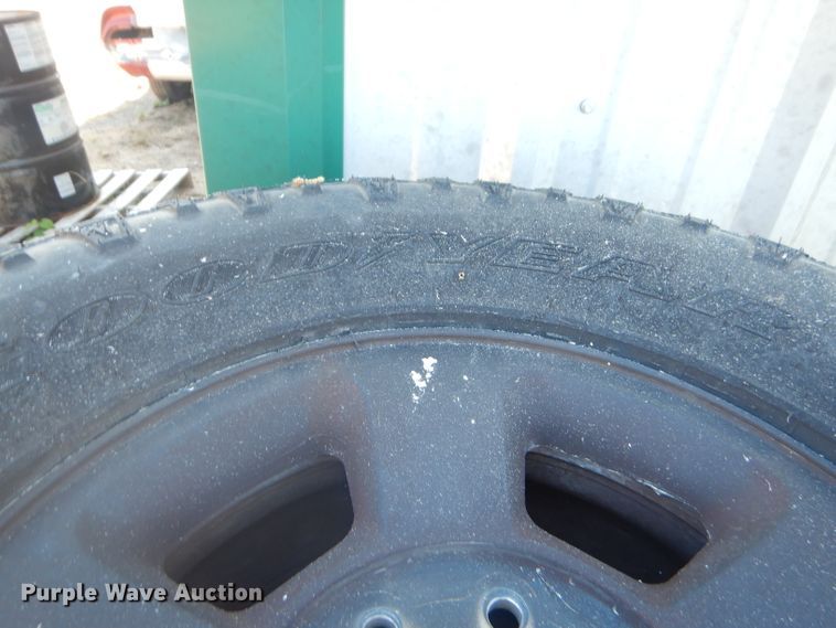 image for item EY9291 (4) 315/70R17 tires and wheels