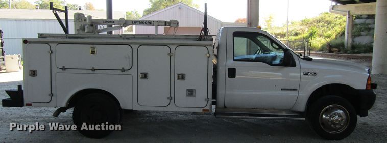 image for item FD9293 2001 Ford F450 Super Duty utility bed truck with crane