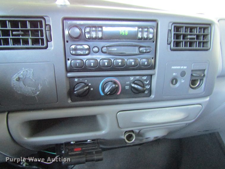 image for item FD9293 2001 Ford F450 Super Duty utility bed truck with crane