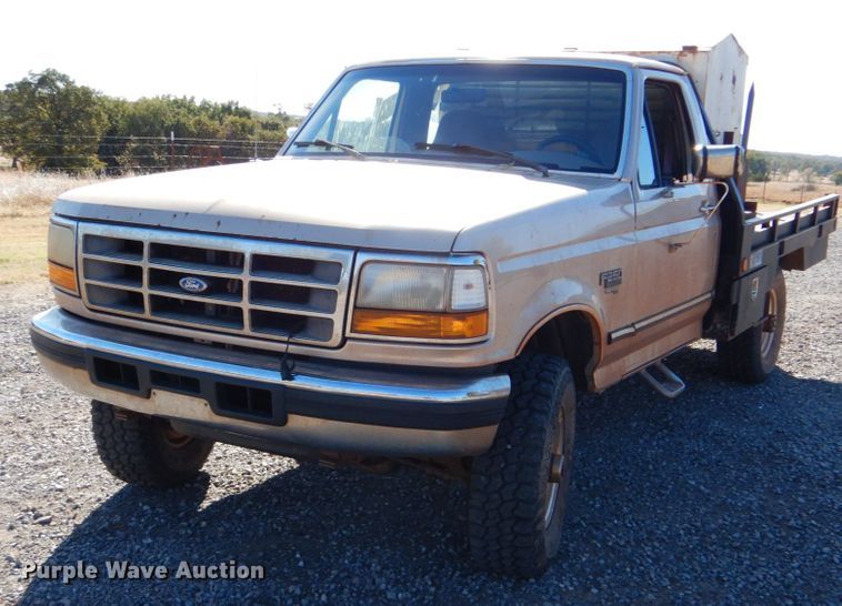 image for item FF9004 1997 Ford F250 bale bed pickup truck