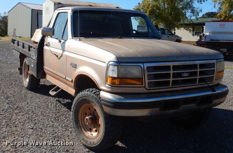 image for item FF9004 1997 Ford F250 bale bed pickup truck