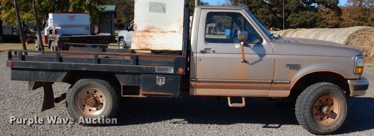 image for item FF9004 1997 Ford F250 bale bed pickup truck