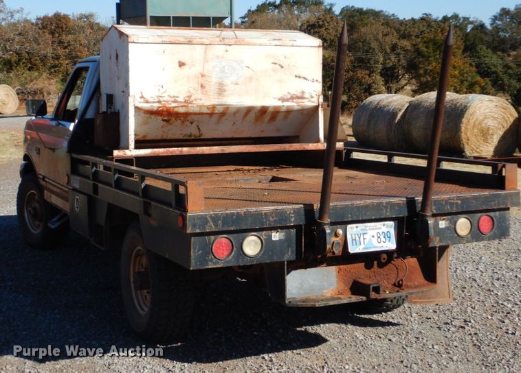 image for item FF9004 1997 Ford F250 bale bed pickup truck