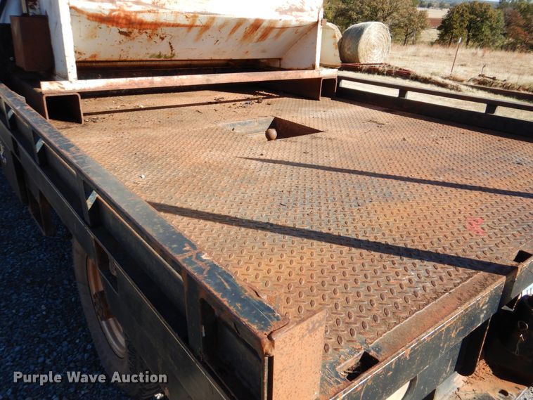 image for item FF9004 1997 Ford F250 bale bed pickup truck