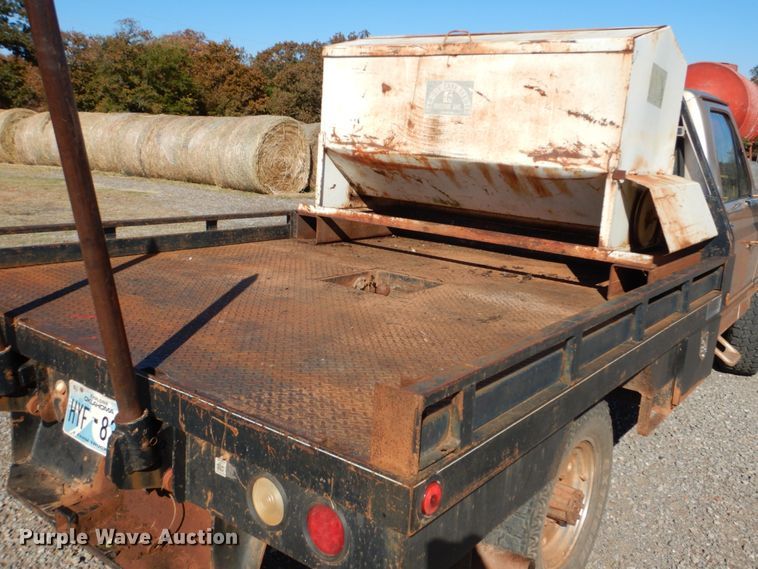 image for item FF9004 1997 Ford F250 bale bed pickup truck