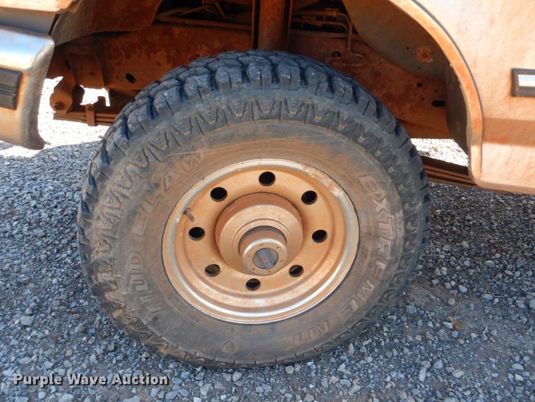 image for item FF9004 1997 Ford F250 bale bed pickup truck