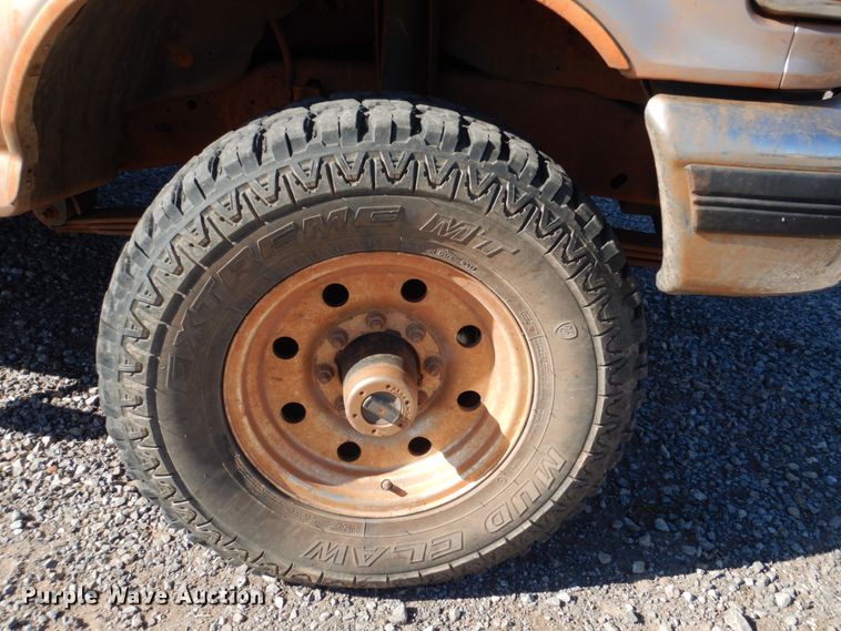 image for item FF9004 1997 Ford F250 bale bed pickup truck