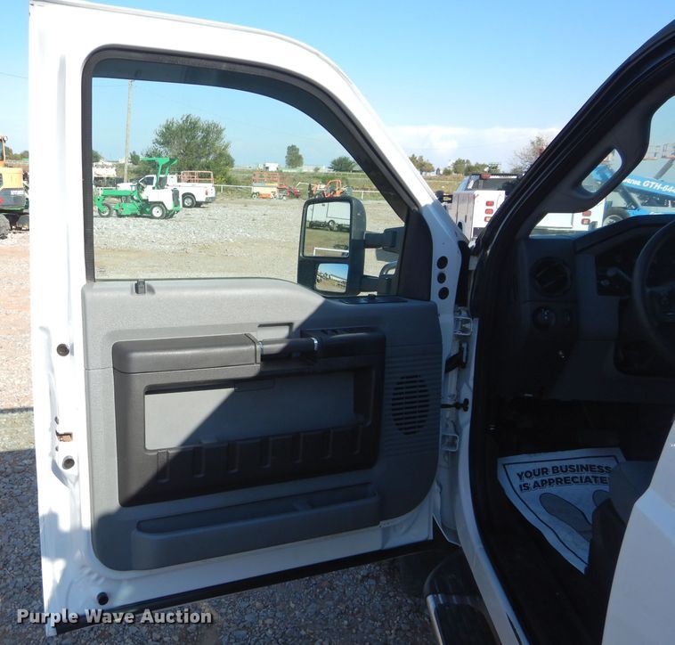 image for item FK9881 2015 Ford F550 Crew Cab flatbed truck