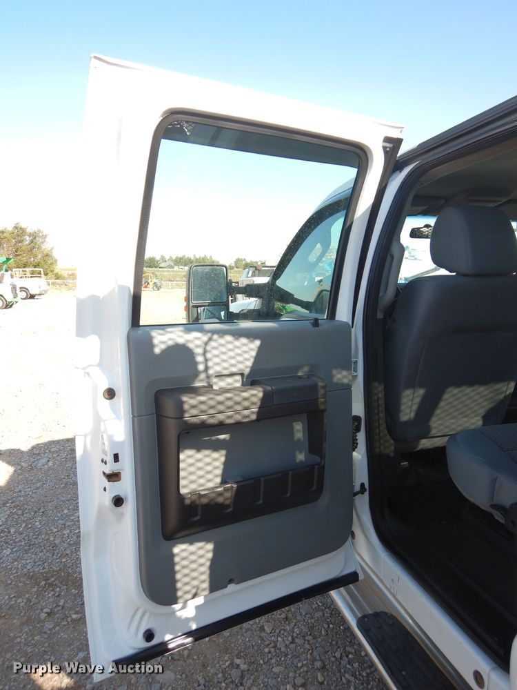 image for item FK9881 2015 Ford F550 Crew Cab flatbed truck