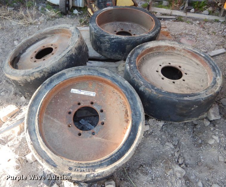 image for item GC9356 (4) 33x6x8 solid tires and wheels