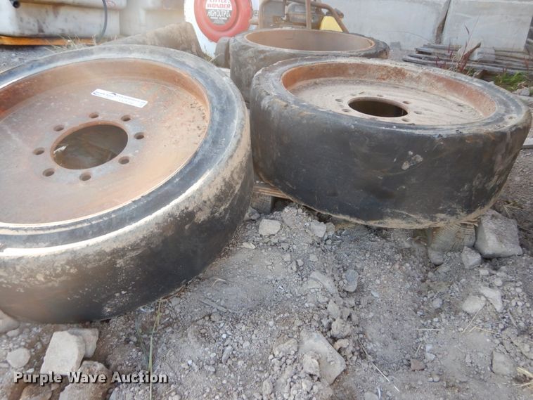 image for item GC9356 (4) 33x6x8 solid tires and wheels