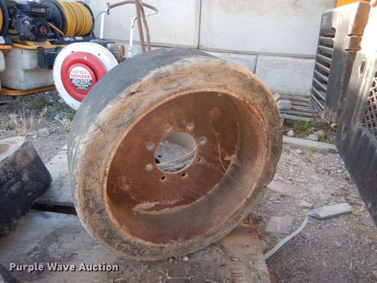 image for item GC9356 (4) 33x6x8 solid tires and wheels