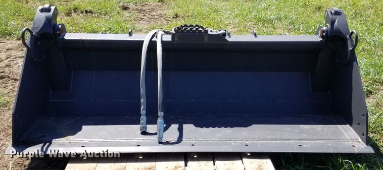 image for item H1063 Bradco 87722557 four-in-one combination skid steer bucket