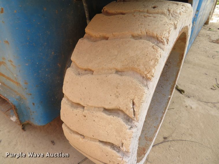 image for item DH1636 2000 Genie GS-3246 scissor lift