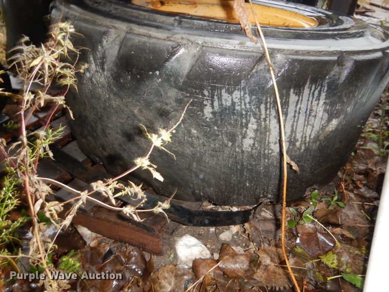 image for item FU9727 (4) 12-16.5 solid tires and wheels