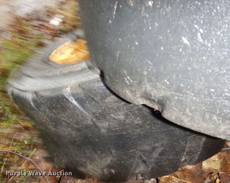 image for item FU9727 (4) 12-16.5 solid tires and wheels