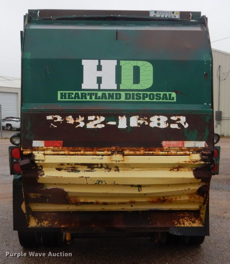 image for item FU9734 1999 Freightliner FL50 refuse truck