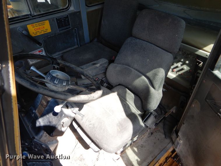 image for item DG7033 1999 Caterpillar 775D haul truck