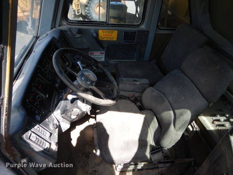 image for item DG7033 1999 Caterpillar 775D haul truck