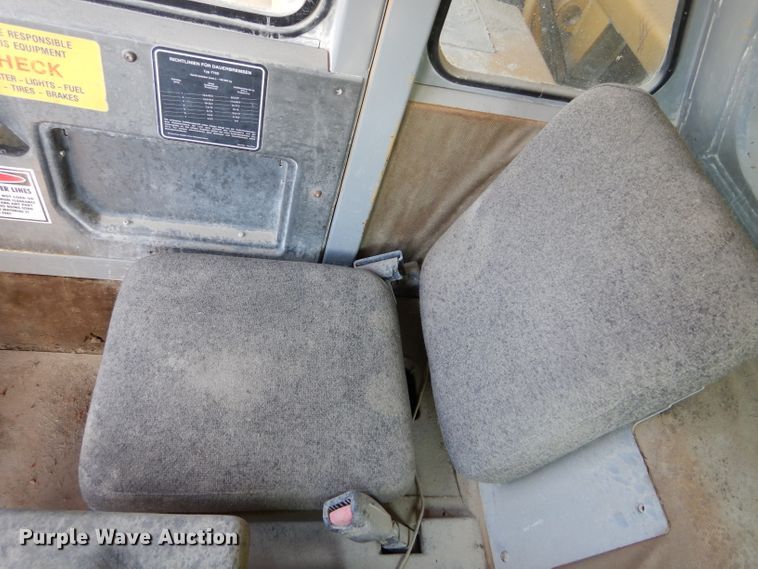 image for item DG7033 1999 Caterpillar 775D haul truck