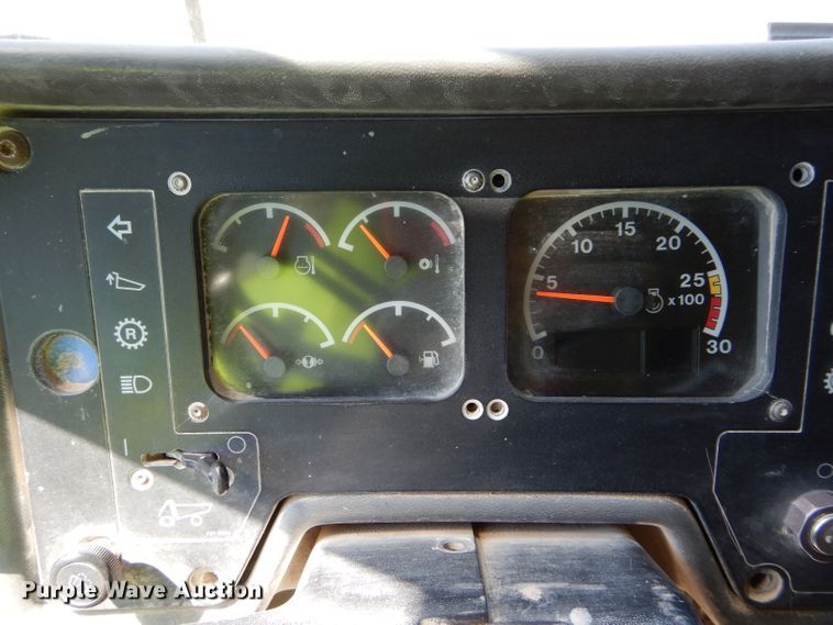 image for item DG7033 1999 Caterpillar 775D haul truck