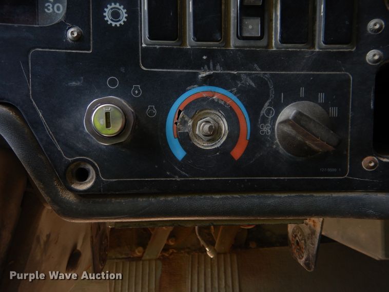 image for item DG7033 1999 Caterpillar 775D haul truck