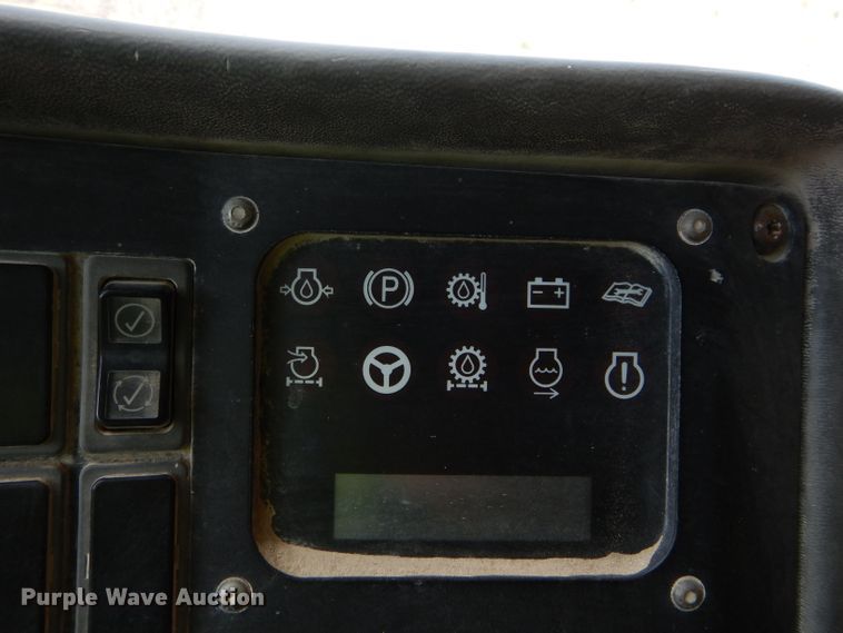 image for item DG7033 1999 Caterpillar 775D haul truck