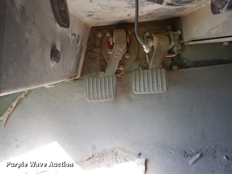 image for item DG7033 1999 Caterpillar 775D haul truck