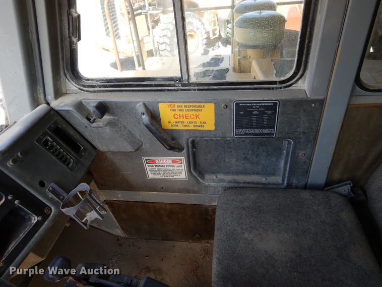 image for item DG7033 1999 Caterpillar 775D haul truck