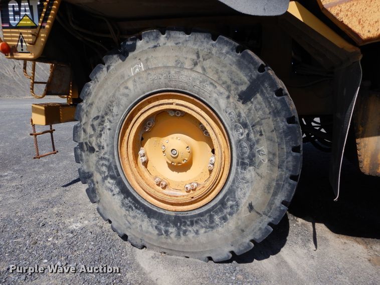 image for item DG7033 1999 Caterpillar 775D haul truck