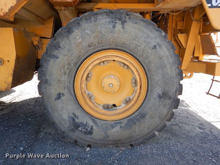 image for item DG7033 1999 Caterpillar 775D haul truck