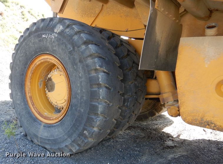 image for item DG7033 1999 Caterpillar 775D haul truck