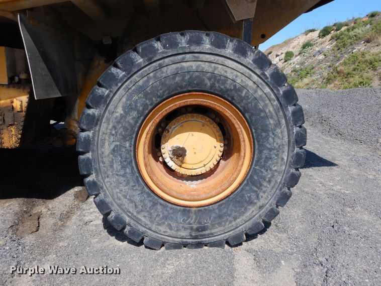 image for item DG7033 1999 Caterpillar 775D haul truck