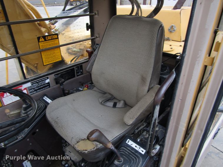 image for item DG6641 1994 John Deere 595D rubber tire excavator