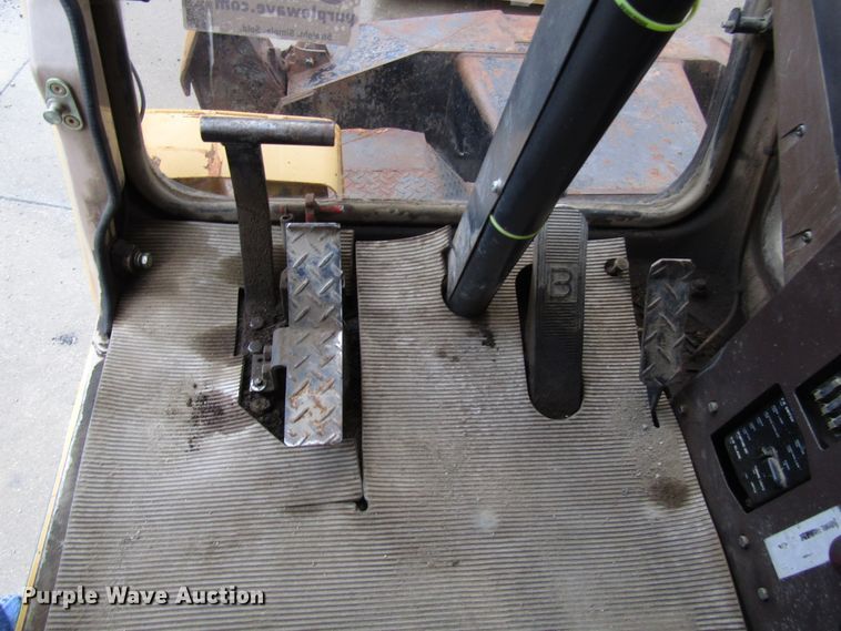 image for item DG6641 1994 John Deere 595D rubber tire excavator