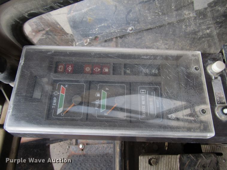 image for item DG6641 1994 John Deere 595D rubber tire excavator