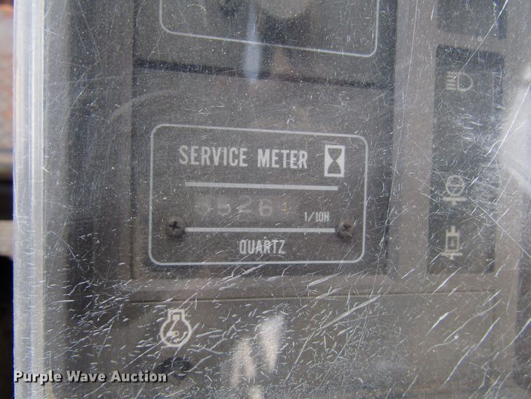 image for item DG6641 1994 John Deere 595D rubber tire excavator