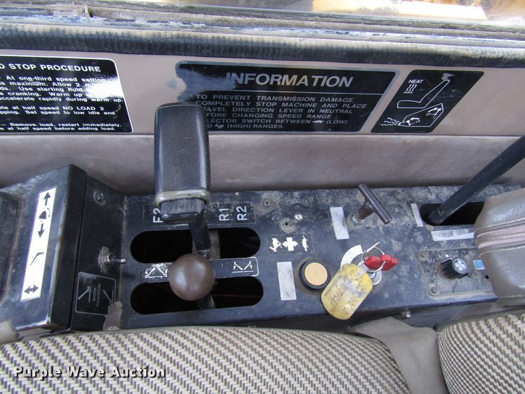 image for item DG6641 1994 John Deere 595D rubber tire excavator