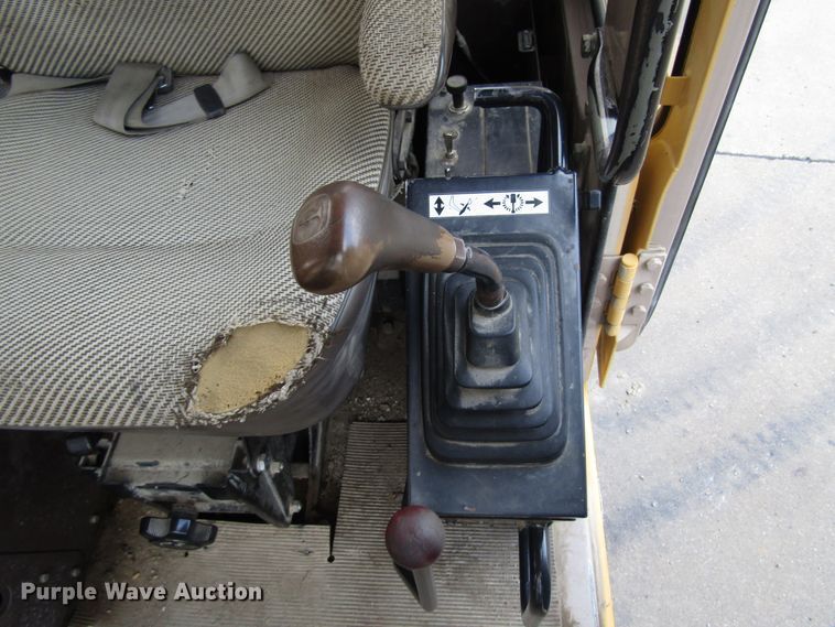 image for item DG6641 1994 John Deere 595D rubber tire excavator