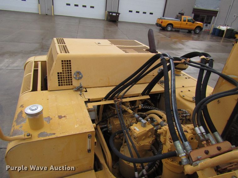 image for item DG6641 1994 John Deere 595D rubber tire excavator