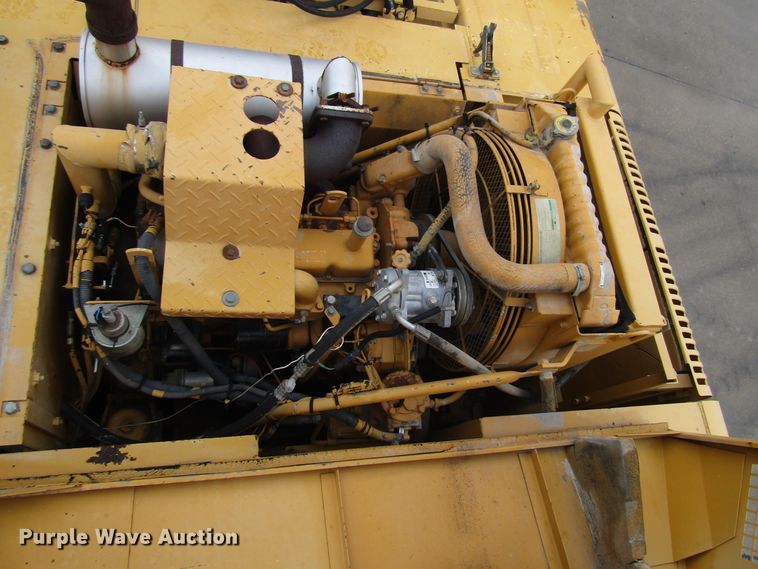 image for item DG6641 1994 John Deere 595D rubber tire excavator