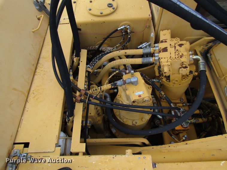 image for item DG6641 1994 John Deere 595D rubber tire excavator