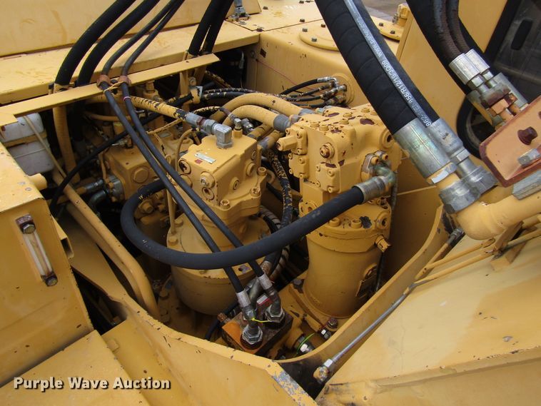 image for item DG6641 1994 John Deere 595D rubber tire excavator